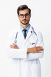 © SHOTPRIME STUDIO - Man portrait of a doctor wearing a white coat and eyeglasses and a stethoscope looking into the camera on a white isolated background, copy space, space for text, health