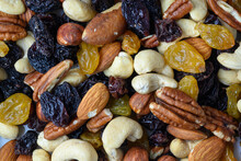 Set Of Nuts And Oriental Sweets And Raisins As A Background