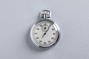 Wall Mural - Vintage timer on light grey background, top view. Measuring tool