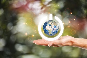 Wall Mural - globe of earth with image of power button in hand