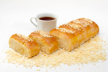 Wall Mural - Bread cheese with nuts and tea on a white background