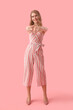 © Pixel-Shot - Young woman on pink background