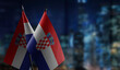© butenkow - Small flags of the Croatia on an abstract blurry background