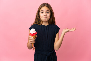 Poster - Child with a cornet ice cream over isolated pink background having doubts while raising hands