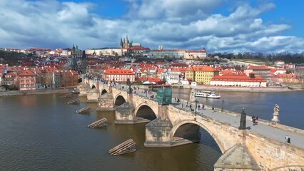 Wall Mural - Scenic spring panoramic aerial view of the Old Town pier architecture and Charles Bridge over Vltava river in Prague, Czech Republic
