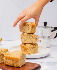 Poster - Moka pot and a stack of cake slices