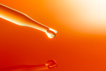 Wall Mural - macro science experiment pipette surface,top view macro shot of chemical dropper injects oil into cl