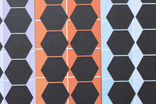 Six Sided Polygon Or Hexagon Shapes Cut From Purple, Orange, And Blue Scrapbook Paper With Distinct "paint Chip" Coloration