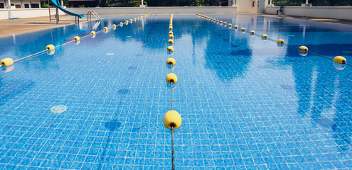 Wall Mural - swimming pool in the Sport Complex. photo of a swimming pool. Empty blue swimming pool