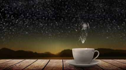 Wall Mural - a hot coffee on the table on a natural background