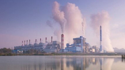 Wall Mural - time lapse video 4k motion. high voltage poles, coal power plant and fog in the morning. mae moh coa