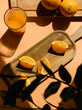 Oranges and orange juice over a table with background