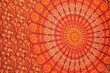 canvas print picture - Orangenes Batiktuch mit Mandala-Muster 