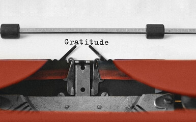 Wall Mural - Text Gratitude typed on retro typewriter