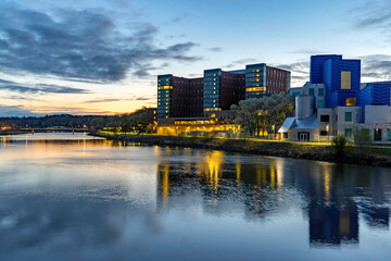 Wall Mural - Reflections of Iowa City in the Iowa River at Sunrise