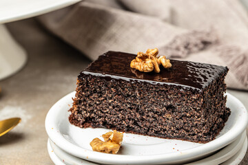 Poppy seed cake with nut served on a plate, banner, menu, recipe place for text, top view