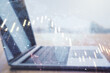 © Pixels Hunter - Double exposure of abstract creative financial chart with world map on laptop background, research and strategy concept