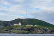 Newfoundland, Canada: The Fox Point Lighthouse (Fishing Point), established in 1912 at the south entrance of St. Anthony Harbor.