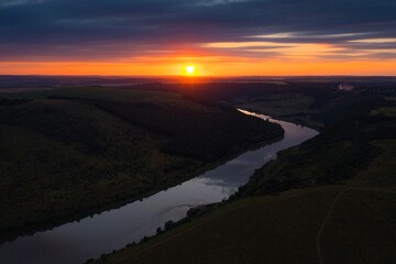 Wall Mural - a dramatic bird's eye view of the river mouth at sunset. dniester canyon national park, ukraine, eur