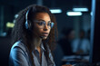 © Masson - girl tech support worker with a microphone and headphones sits at table with laptop computer on dark background, created with Generative AI Technology