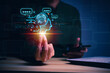© teerawat - Businessman holding hologram digital chatbot,  conversational assistant, AI Artificial Intelligence concept, chat bot application, digital chatbot on virtual screen.
