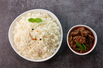 Poster - Mutton or Beef biryani Ghee rice. Gosht or lamb biryani Hyderabadi Dum biriyani with raita yoghurt dip. Special occasion festival food for Ramadan Eid Easter Christmas Kerala Hyderabad India.