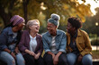 © MoniStock - Disabled person laughing with his friends in the park. generate by ai