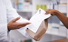 Pharmacy, Medicine Or Pharmacist Hands A Bag In Drugstore With Healthcare Prescription Receipt. Zoom, Person Shopping Or Doctor Giving Customer Products, Pills Or Package For Medical Retail Services