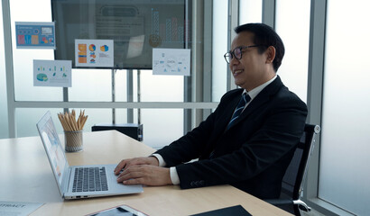 Wall Mural - asian business man working at office