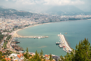 Sticker - Aerial view of Alanya marina and city on a cloudy day