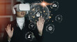 © CREATIVE WONDER - Metaverse ar technology. Virtual reality, businesswoman with vr headset, globalization or future business innovation touching connecting with virtual screen.