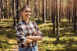 © ronstik - smiling female forester or forest owner. forestry and forest management