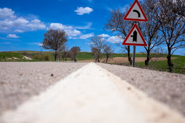 Beautiful country road and road signs
