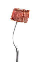 Canvas Print - Fork with a piece of new york steak on white background. Medium rare. With clipping path.