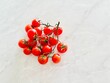Close-up of fresh cherry tomatoes on a white background