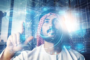 Muslim businessman working with floating data visualization screen