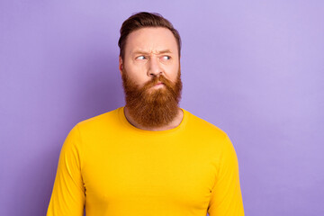 Portrait of young suspicious look mockup guy red hair beard wear yellow trendy pullover unsure purchase isolated on purple color background