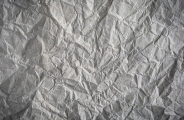 Crumpled gray paper. Abstract background. Banner. Copy space. Selective focus.
