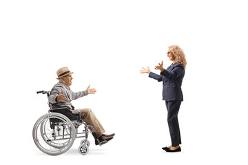 Canvas Print - Woman meeting an elderly man in a wheelchair