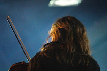 Poster - Band playing music and a gig in a venue, close up of a rock band playing guitars and instruments.