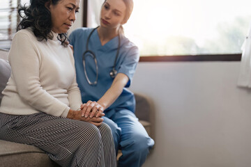 Empathy, trust and nurse holding hands with patient for help, consulting support and healthcare advice. Kindness, counseling and medical therapy in nursing home for hope, consultation and psychology