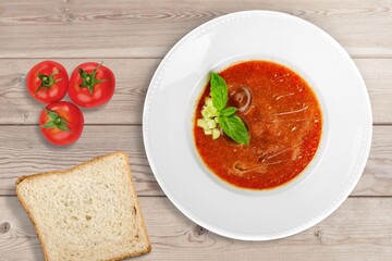 Poster - Bowl of hot tasty soup dish on the desk