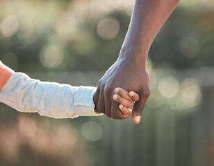 Wall Mural - My dad is my first friend, best friend and forever friend. a young boy holding on to his fathers hand while walking outside.