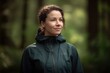 © Robert MEYNER - Portrait of a beautiful young woman in a raincoat in the forest