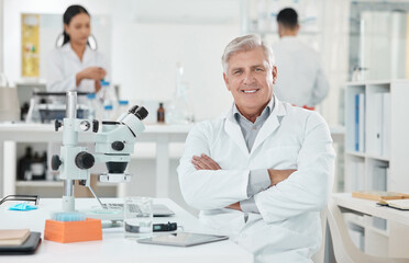 Wall Mural - my next discovery will be huge. portrait of a senior scientist working in a lab.