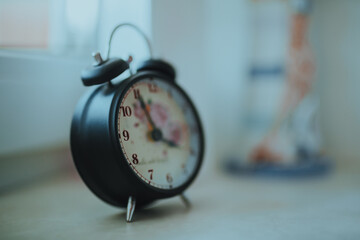 Alarm clock on the windowsill