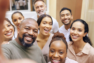 Wall Mural - Today, were choosing fun. a group of colleagues taking a selfie in a office.