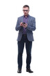 © ASDF - Young handsome business man typing message on smartphone touch screen