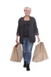 full-length. casual mature woman with shopping bags .