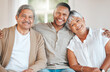 © K Davis/peopleimages.com - He is the heartbeat we share. Portrait of a mature couple bonding on the sofa with their son at home.